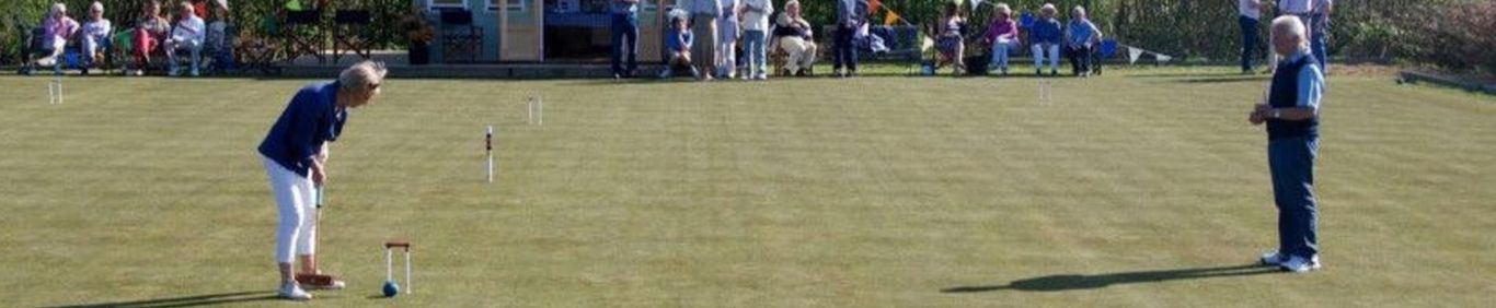 You can just play socially or with family or you can enter club competitions which have all been good fun and a great way to meet local people. We are a very friendly club and you would be very warmly welcomed.  We will give you free lessons in Golf Croquet which has become the most popular form of croquet world wide. It’s a simple game to learn but as you can imagine, difficult to master. That’s the fun of it.   If you are interested and would like to know more then please do get in touch with our club membership secretary, John West.  John’s email address is: johnrwest@btintenet.com    His phone number is: 01798 861515